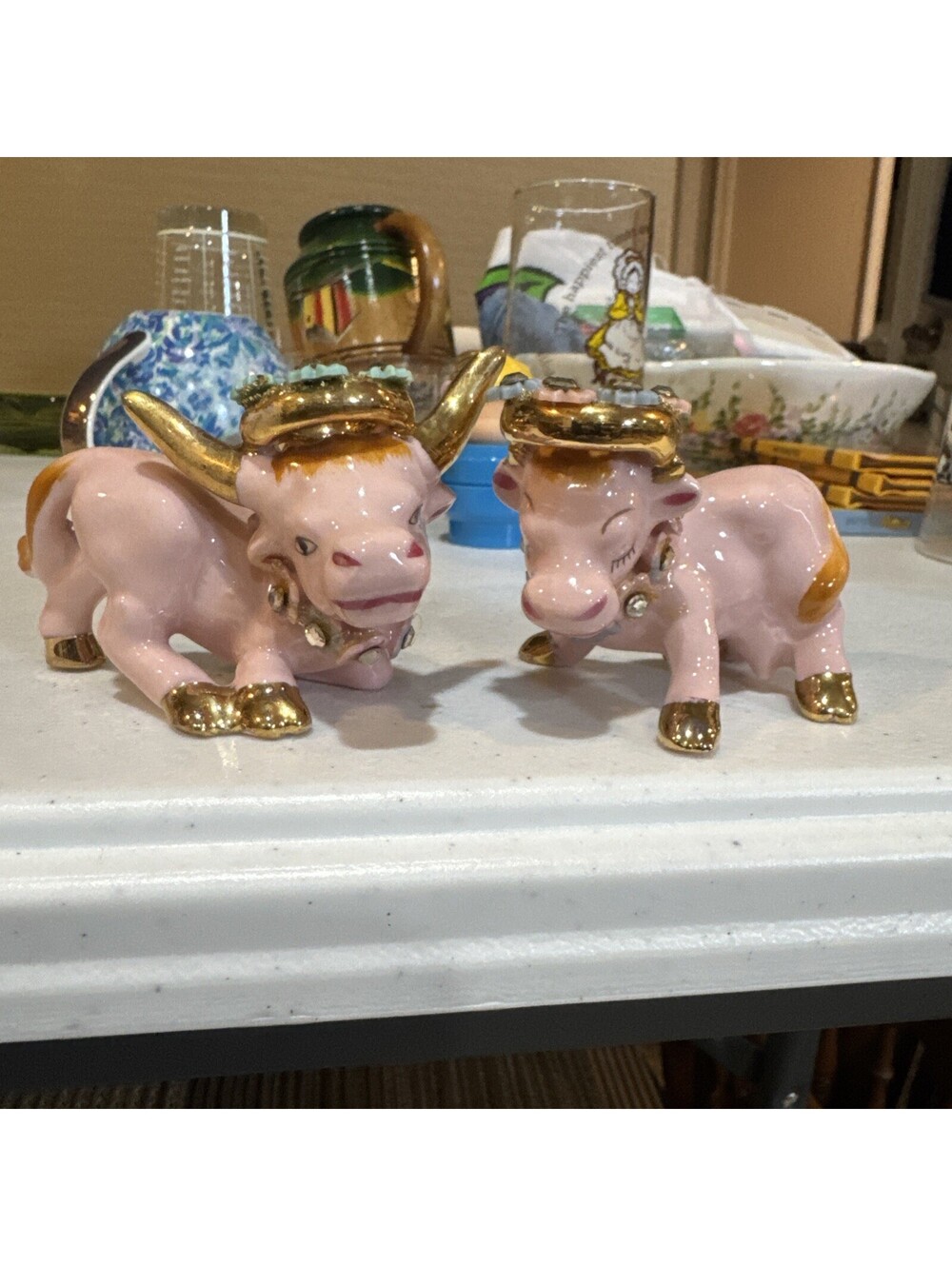1950s pink and gold ceramic cow and bull salt and pepper shakers
